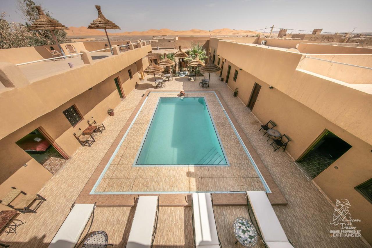 L'Homme Du Desert A Merzouga Bagian luar foto