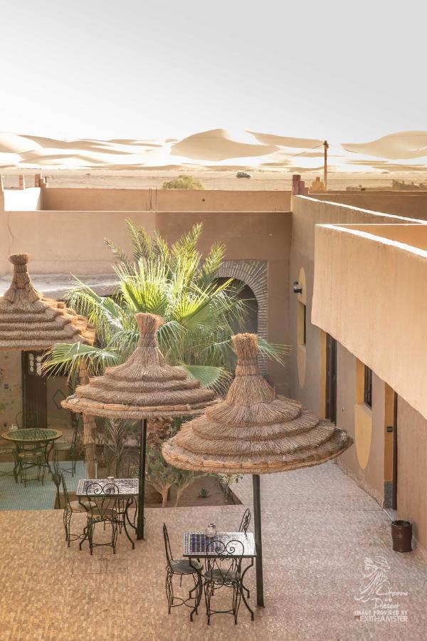 L'Homme Du Desert A Merzouga Bagian luar foto