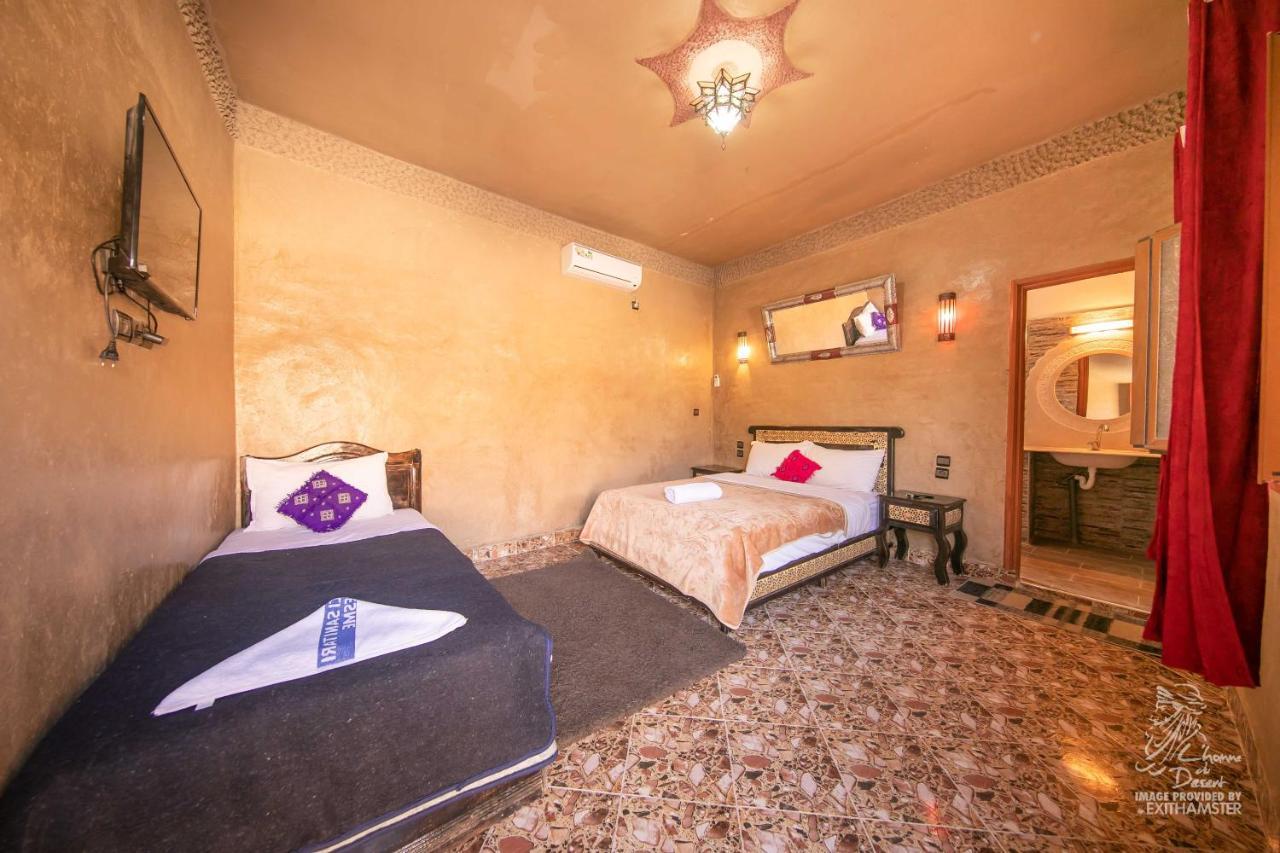L'Homme Du Desert A Merzouga Bagian luar foto
