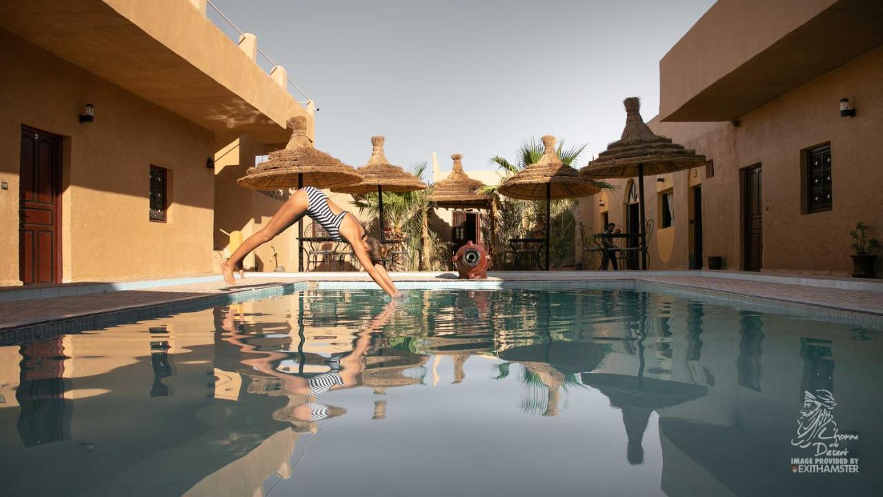 L'Homme Du Desert A Merzouga Bagian luar foto